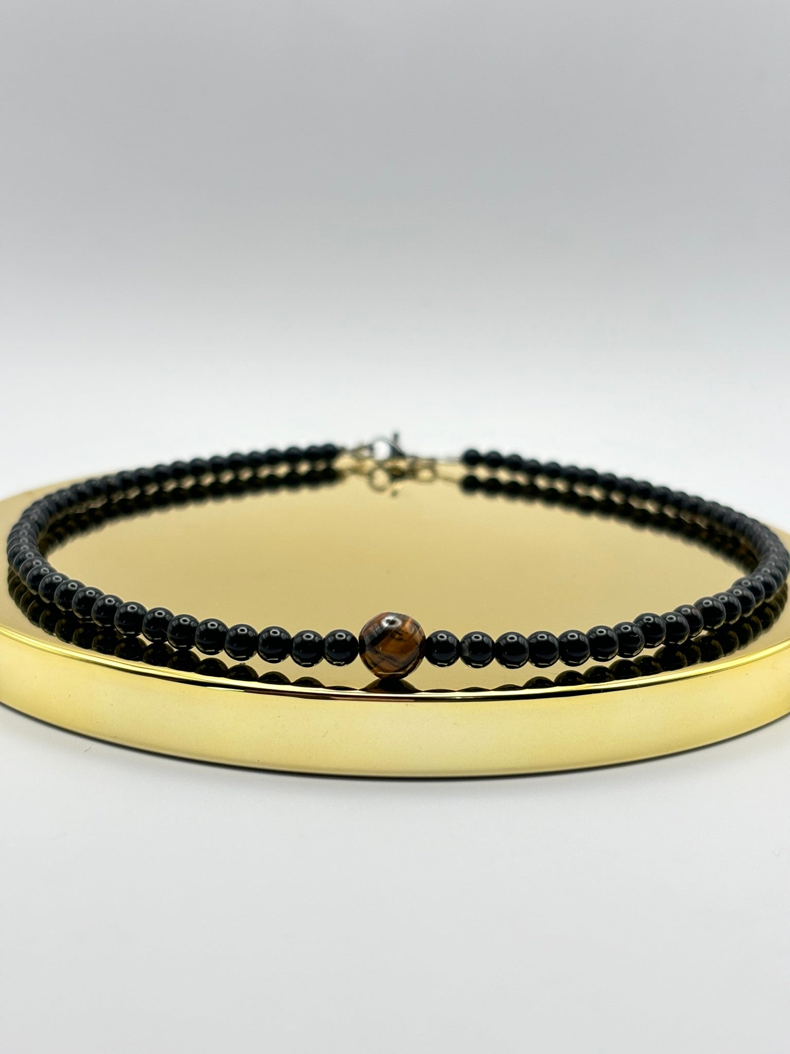 Gargantilla de ónix con ojo de tigre