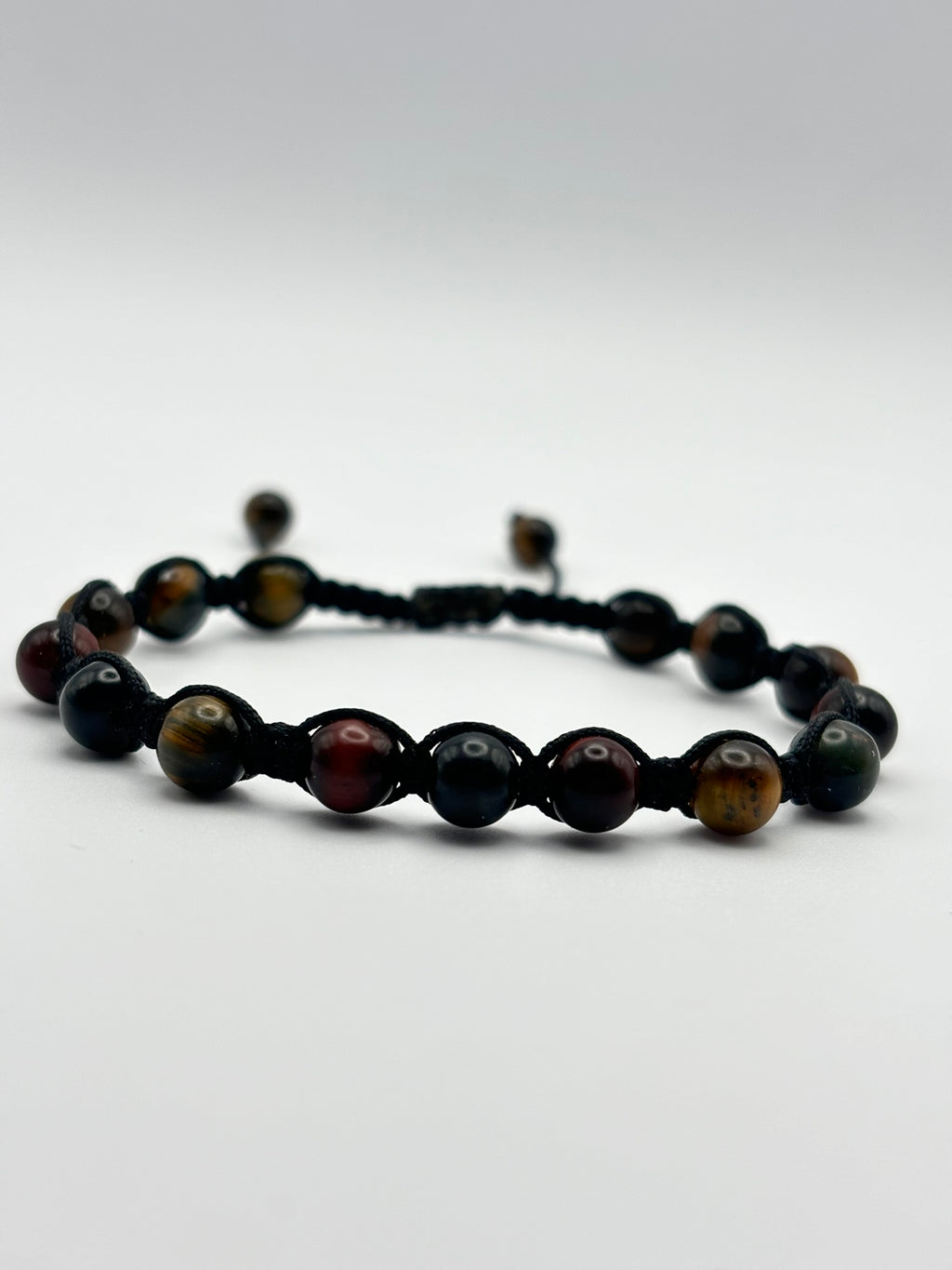 Pulsera Artesanal de Tres Ojos – Protección, Claridad y Energía Positiva