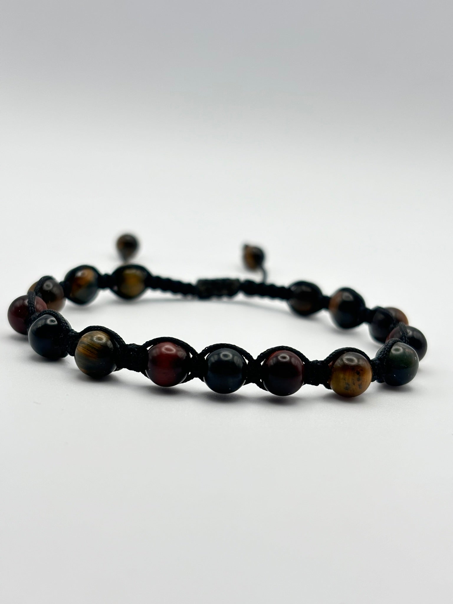 Pulsera Artesanal de Tres Ojos – Protección, Claridad y Energía Positiva