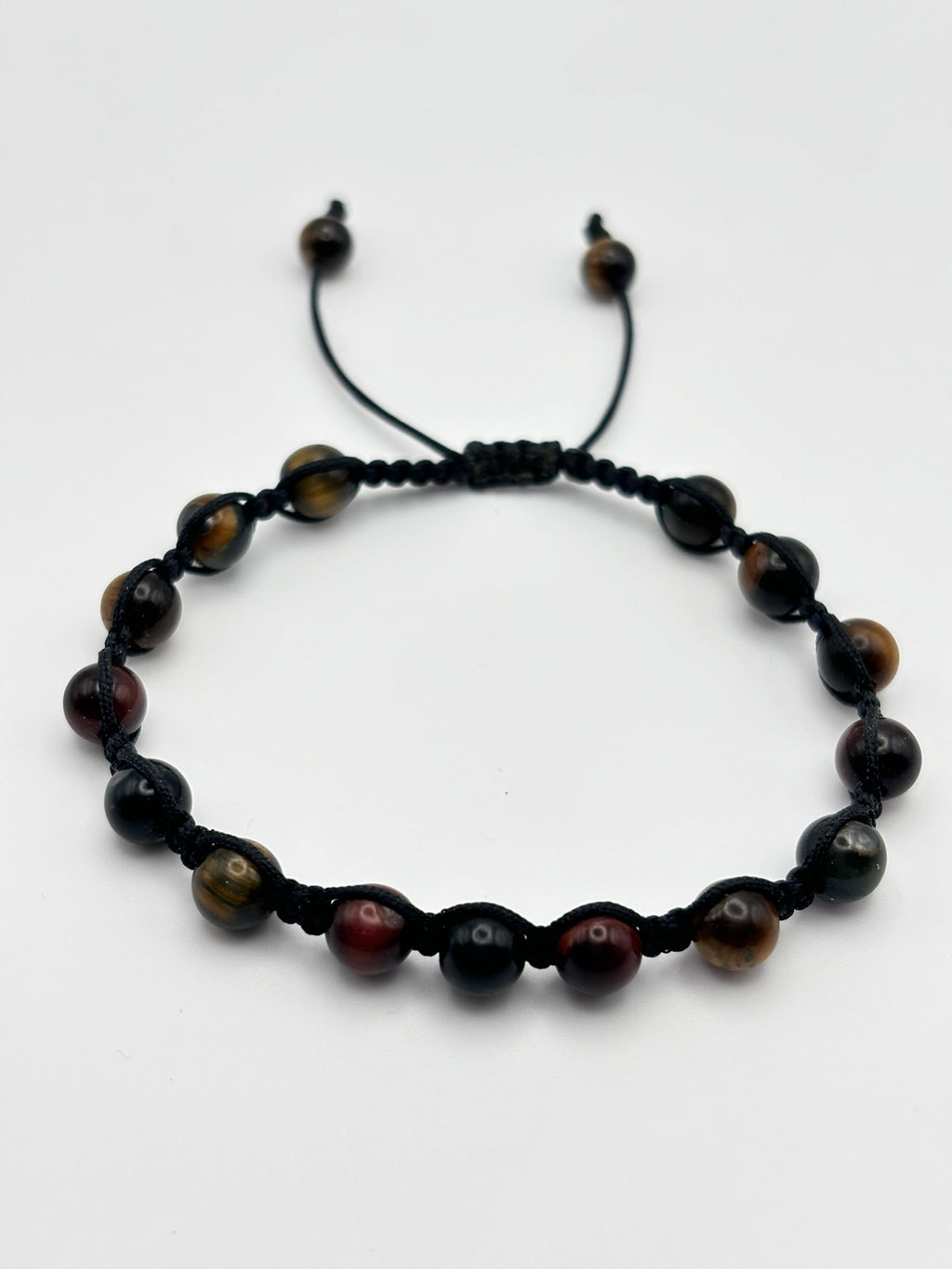 Pulsera Artesanal de Tres Ojos – Protección, Claridad y Energía Positiva