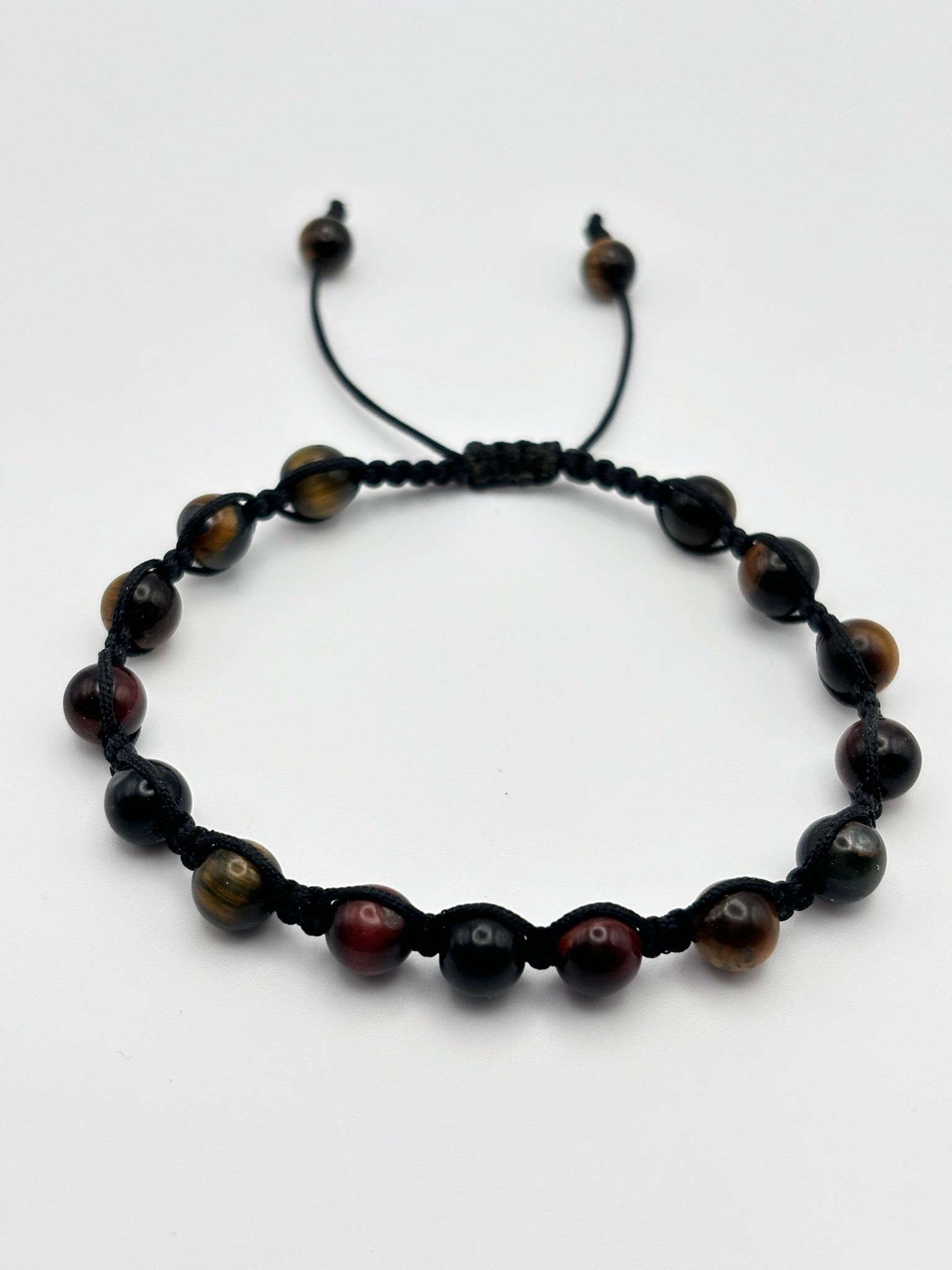 Pulsera Artesanal de Tres Ojos – Protección, Claridad y Energía Positiva