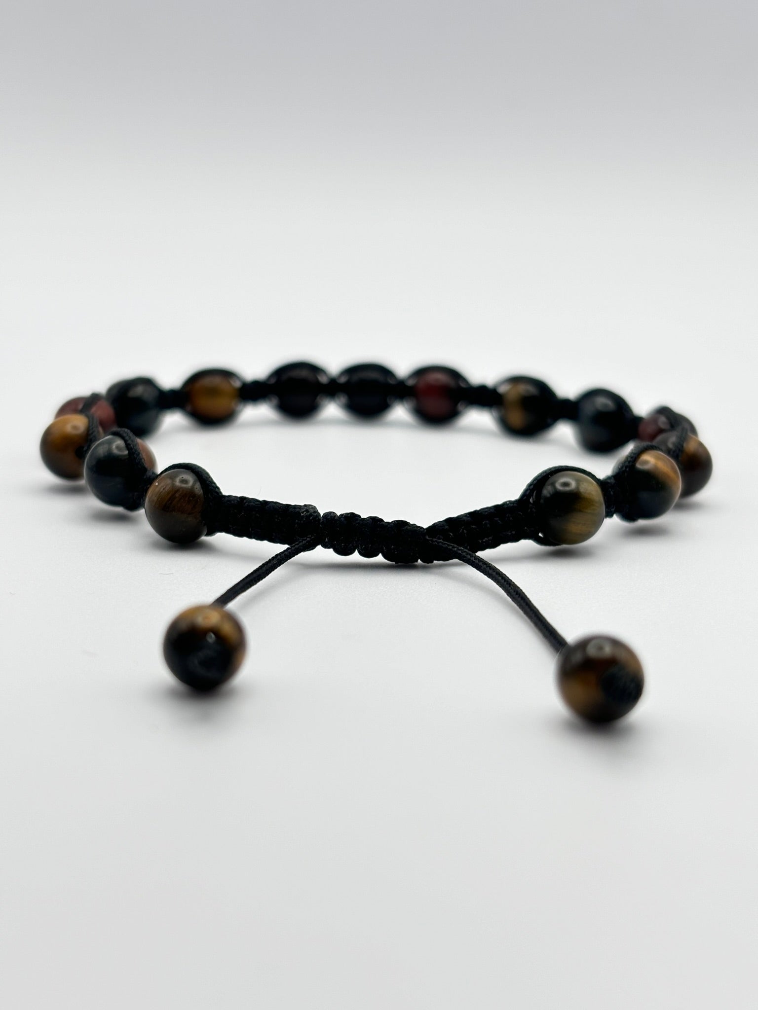 Pulsera Artesanal de Tres Ojos – Protección, Claridad y Energía Positiva