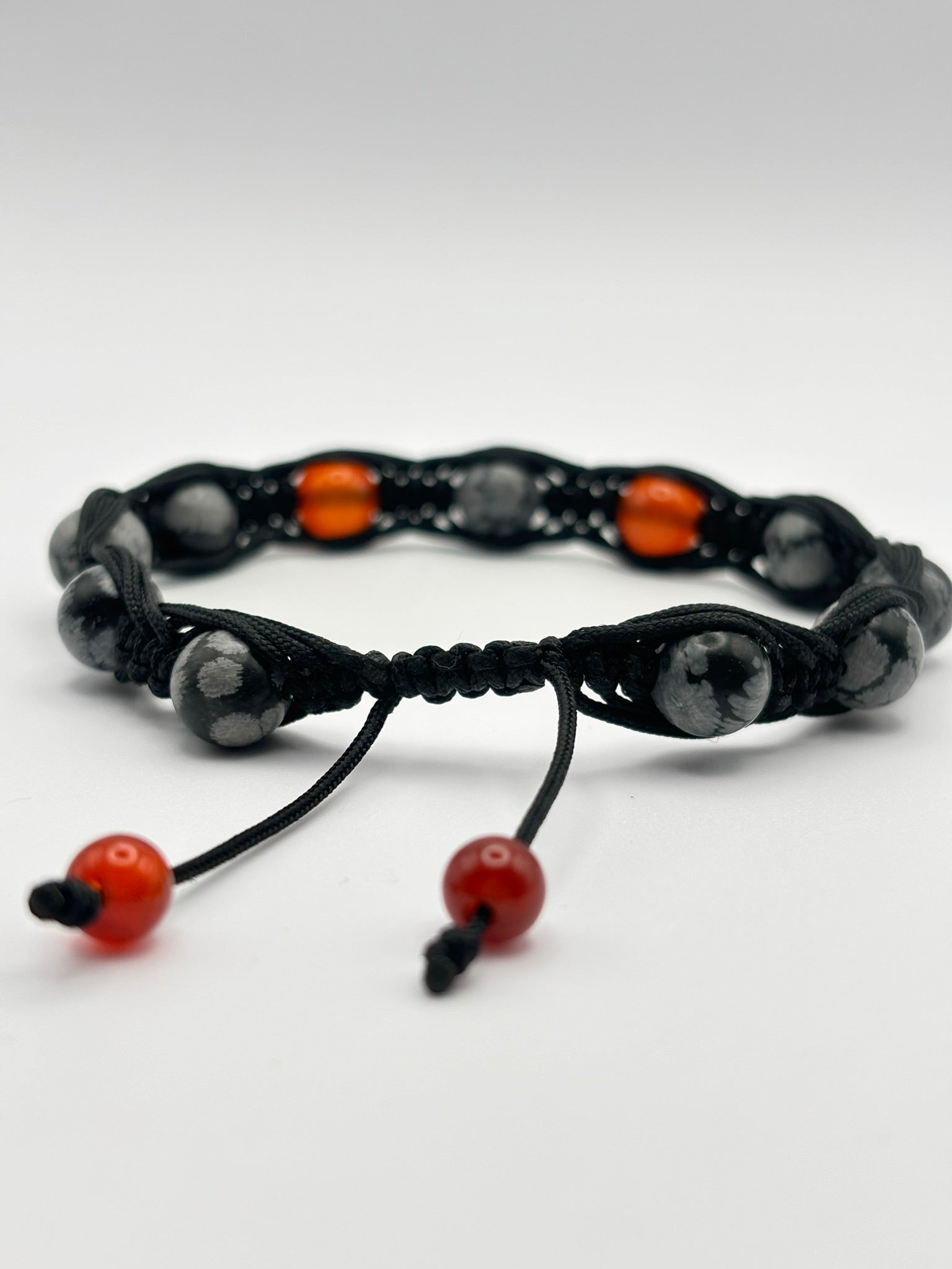 Pulsera de Obsidiana Copo de Nieve y Cornalina – Protección, Equilibrio y Vitalidad