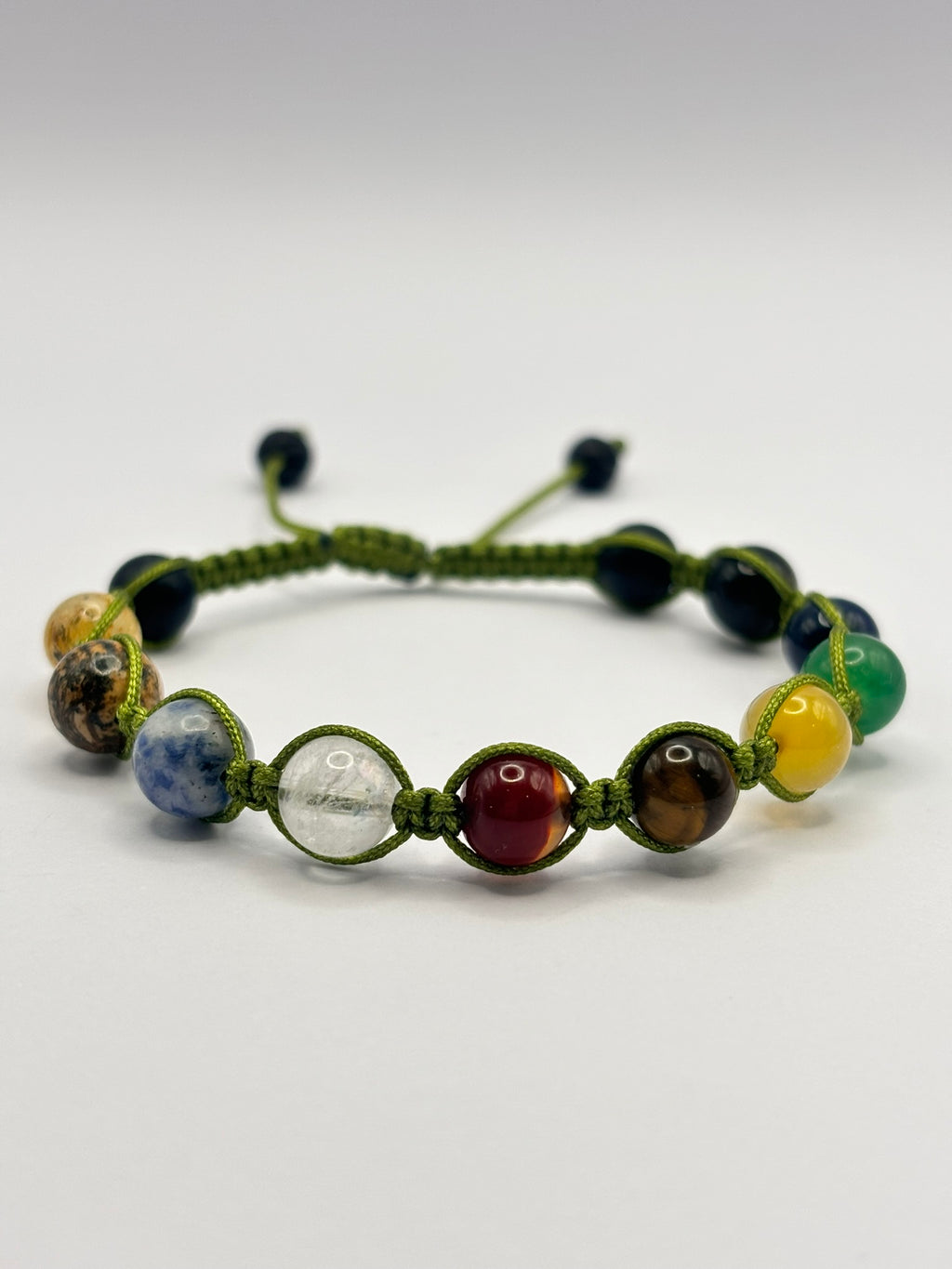 Pulsera 9 Planetas + Astros Tejido macramé – Conexión Cósmica, Equilibrio y Protección