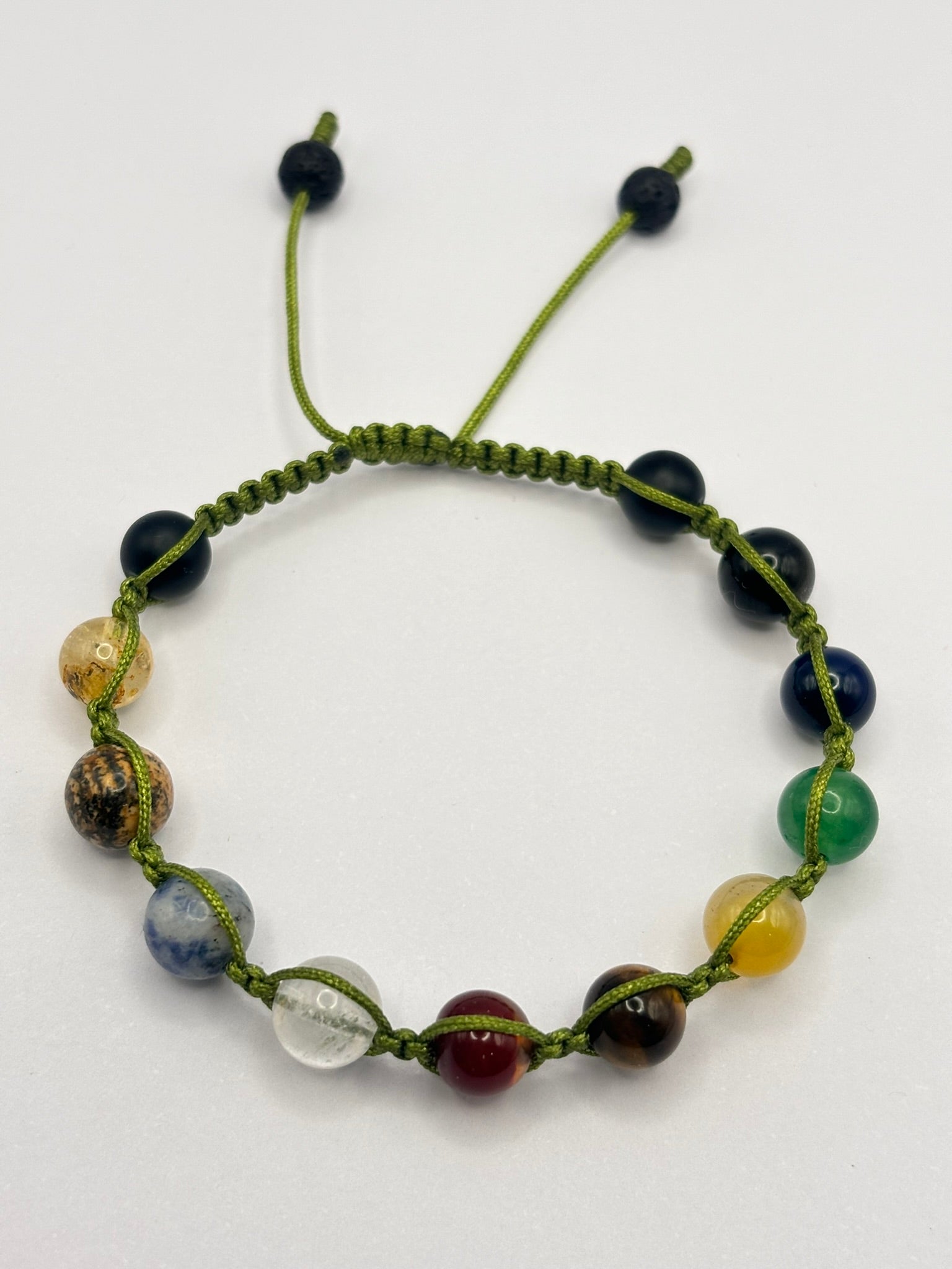 Pulsera 9 Planetas + Astros Tejido macramé – Conexión Cósmica, Equilibrio y Protección