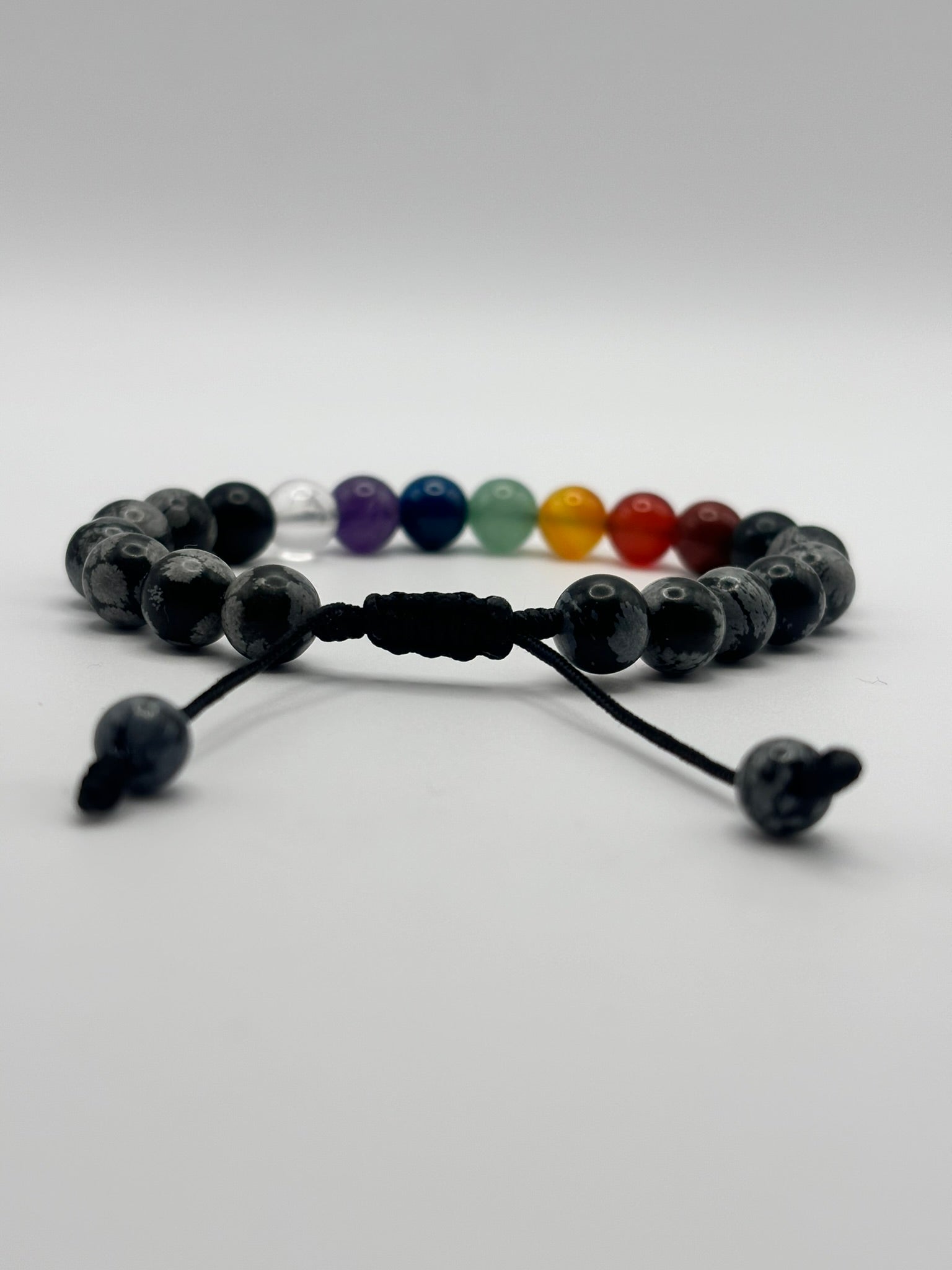 Pulsera 7 Chakras con Obsidiana Copo de Nieve – Protección, Armonía y Estabilidad Energética