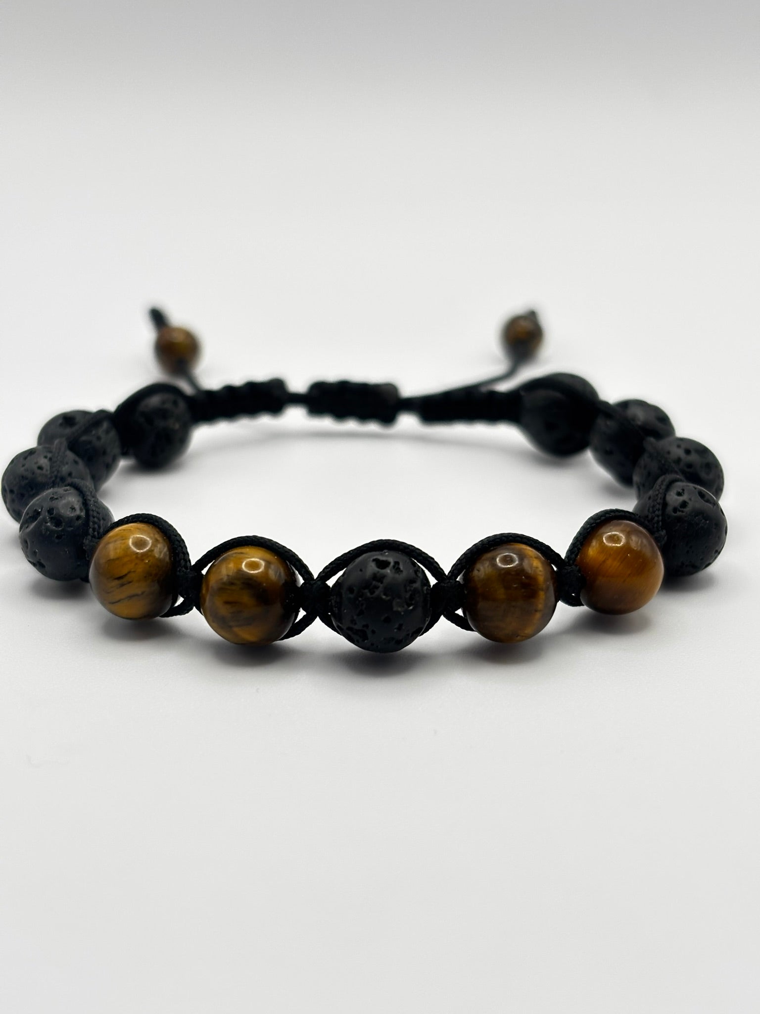 Pulsera de Ojo de Tigre con Piedra Volcánica – Protección, Fuerza y Equilibrio Energético