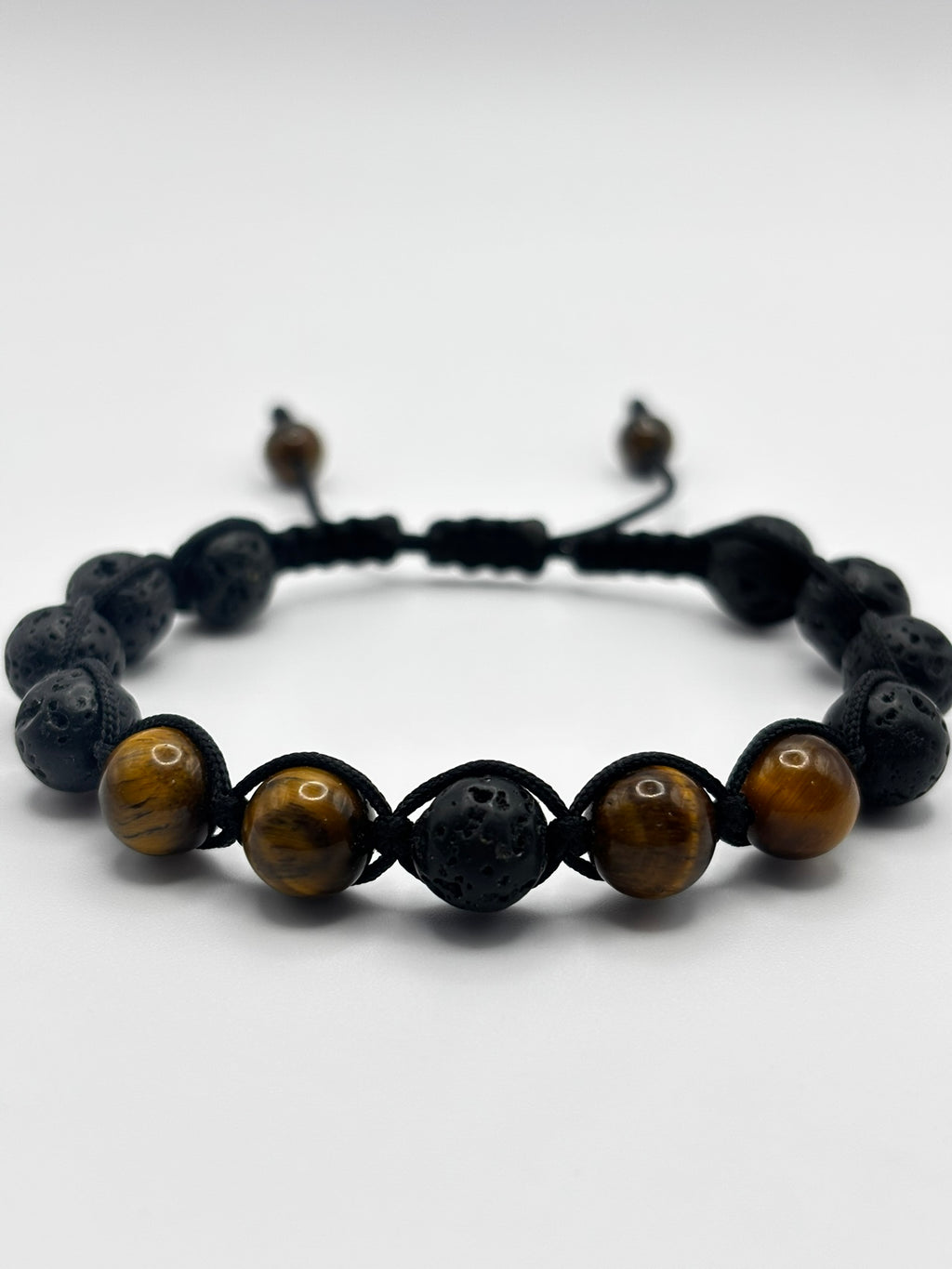 Pulsera de Ojo de Tigre con Piedra Volcánica – Protección, Fuerza y Equilibrio Energético