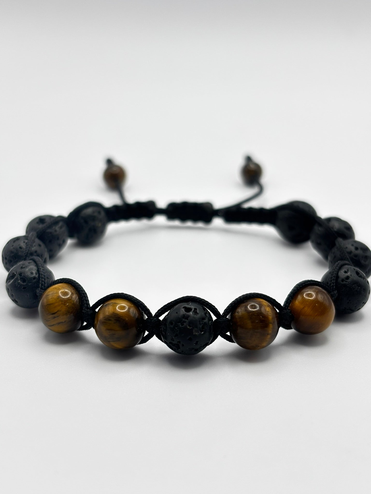 Pulsera de Ojo de Tigre con Piedra Volcánica – Protección, Fuerza y Equilibrio Energético