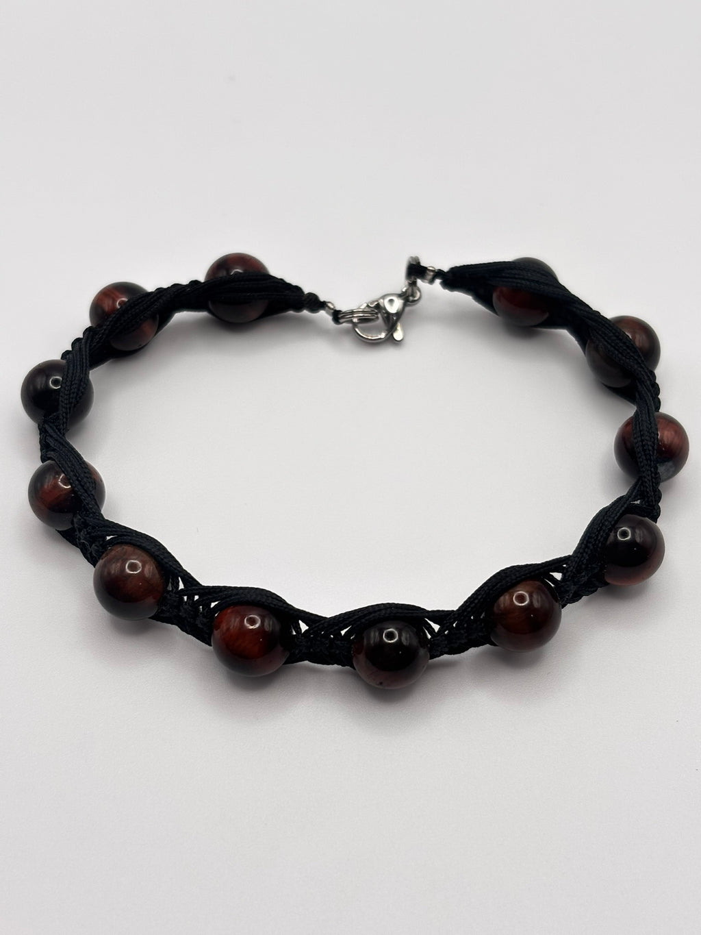 Pulsera de Ojo de Buey con Tejido Macramé – Fuerza, Estabilidad y Confianza Interior