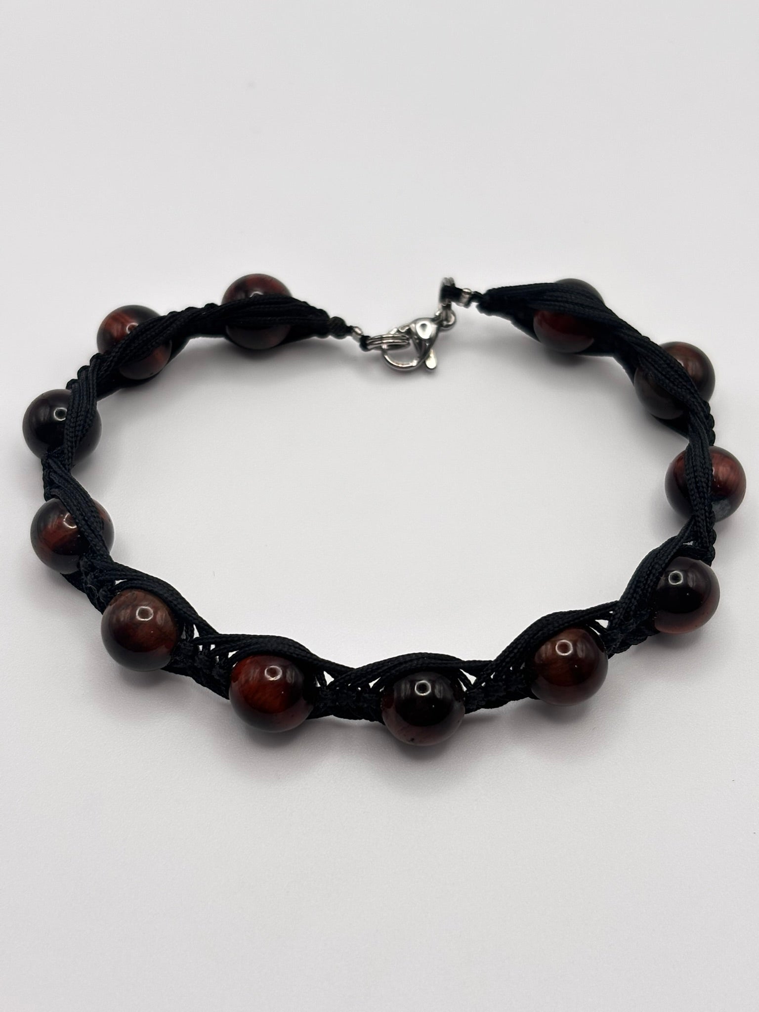 Pulsera de Ojo de Buey con Tejido Macramé – Fuerza, Estabilidad y Confianza Interior