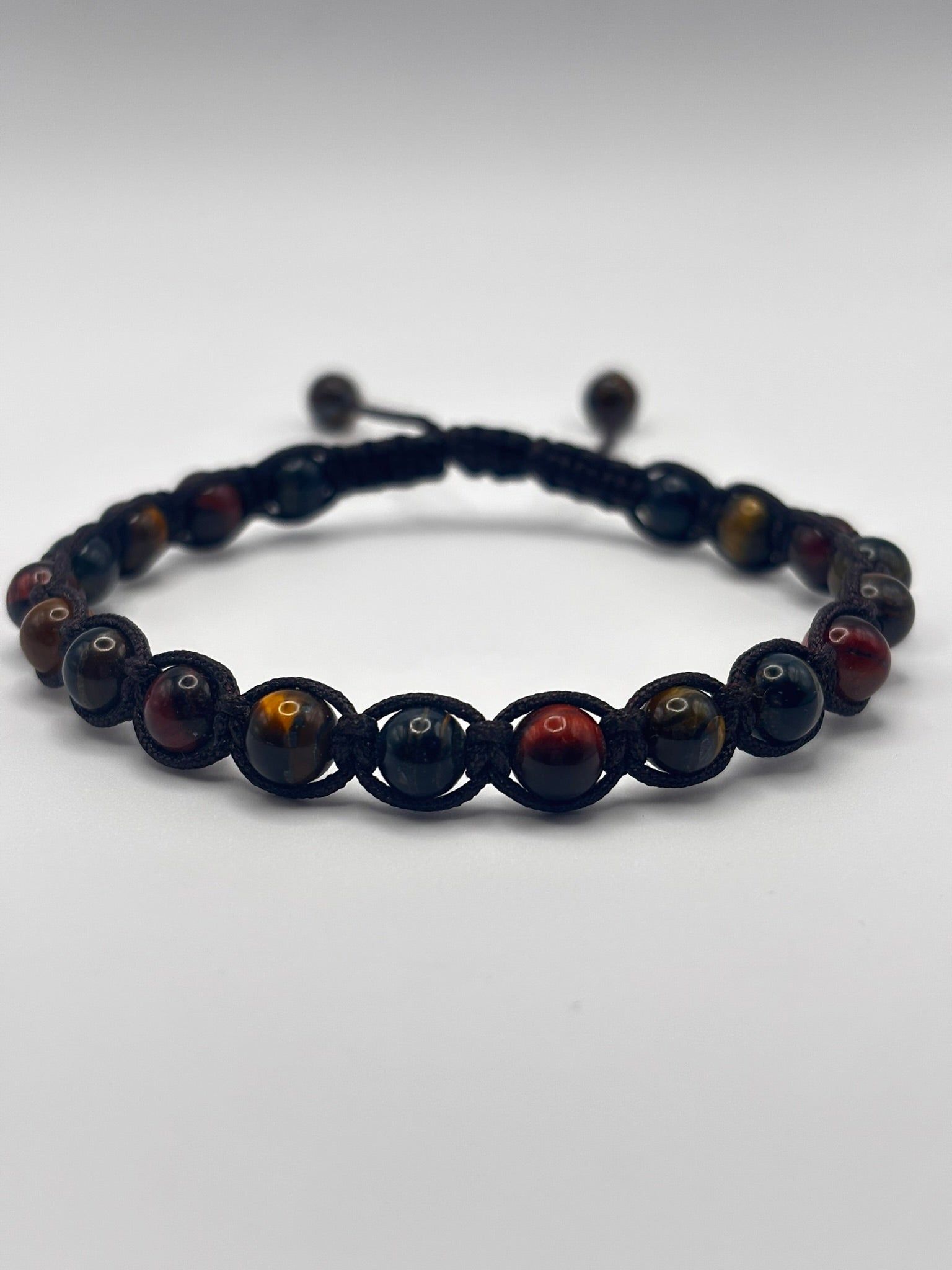 Pulsera Artesanal de Tres Ojos – Protección, Claridad y Energía Positiva