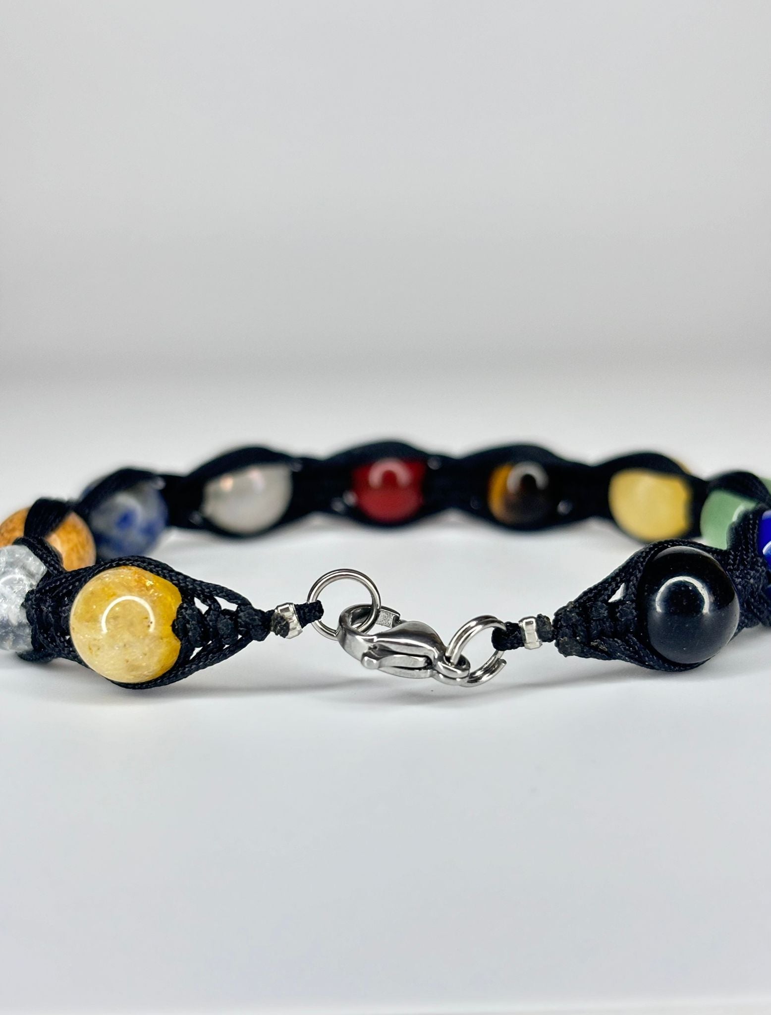 Pulsera 9 Planetas + Astros Trenzado – Conexión Cósmica, Equilibrio y Protección