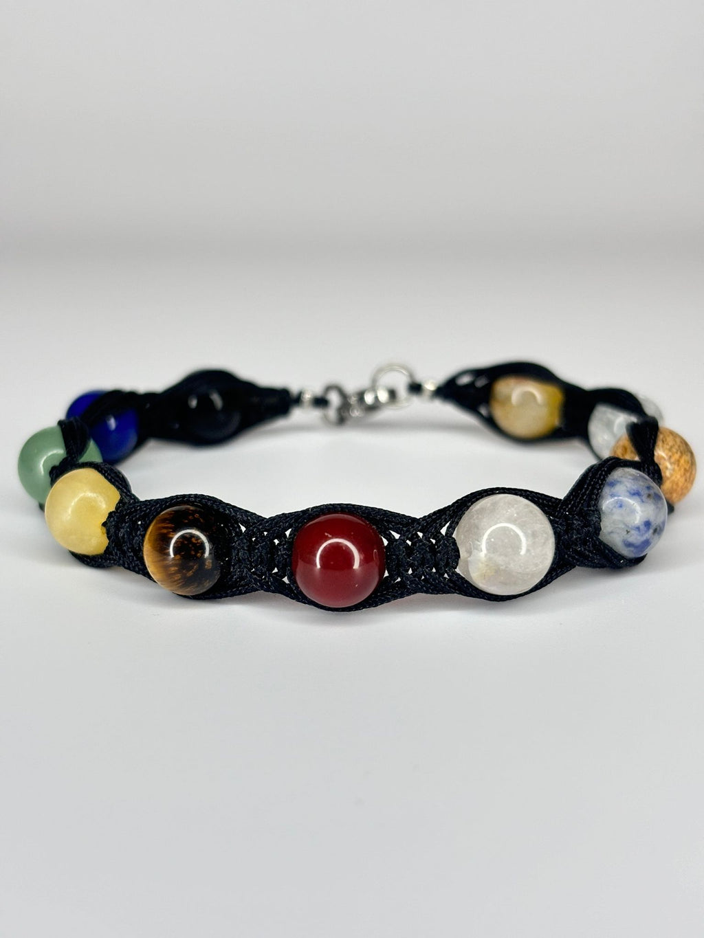 Pulsera 9 Planetas + Astros Trenzado – Conexión Cósmica, Equilibrio y Protección