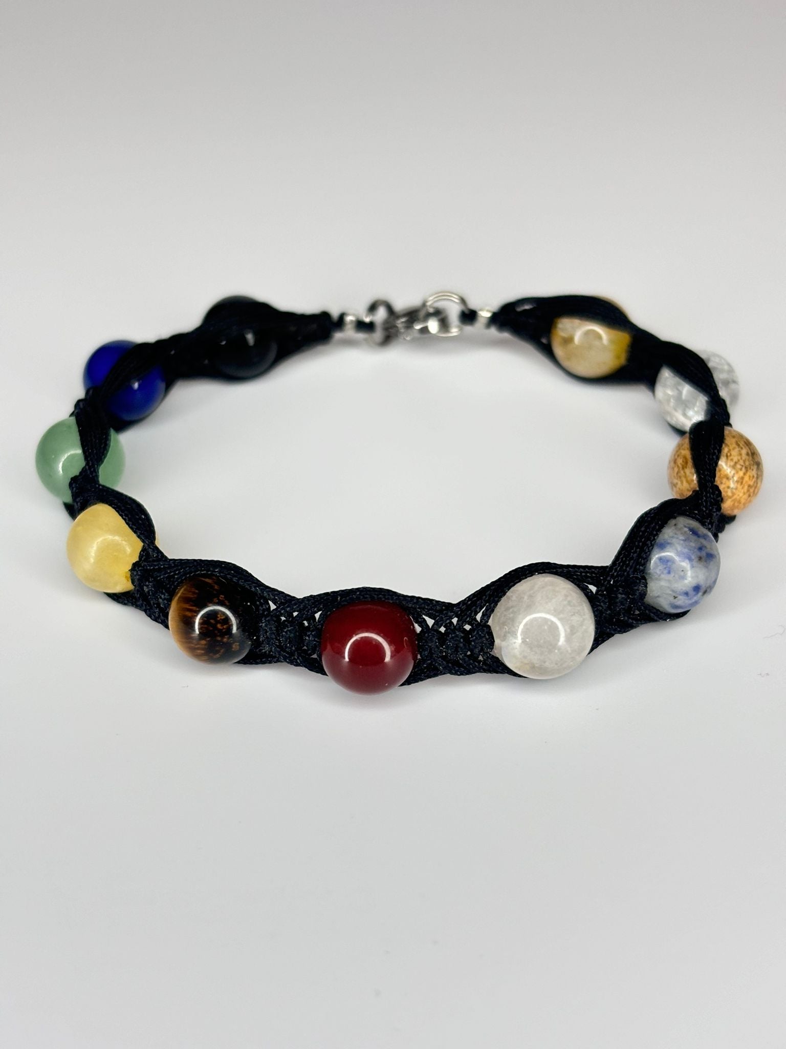 Pulsera 9 Planetas + Astros Trenzado – Conexión Cósmica, Equilibrio y Protección