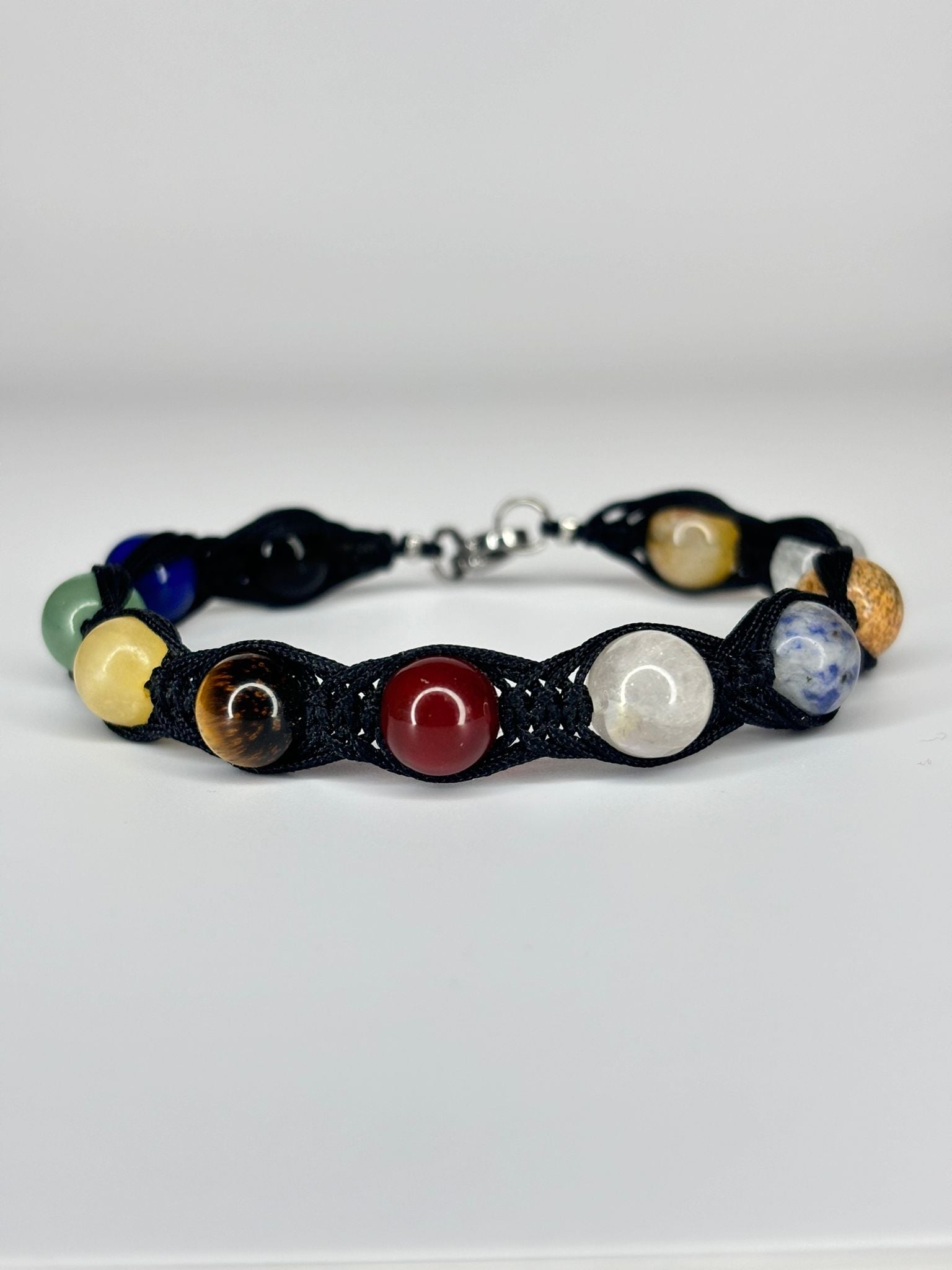 Pulsera 9 Planetas + Astros Trenzado – Conexión Cósmica, Equilibrio y Protección