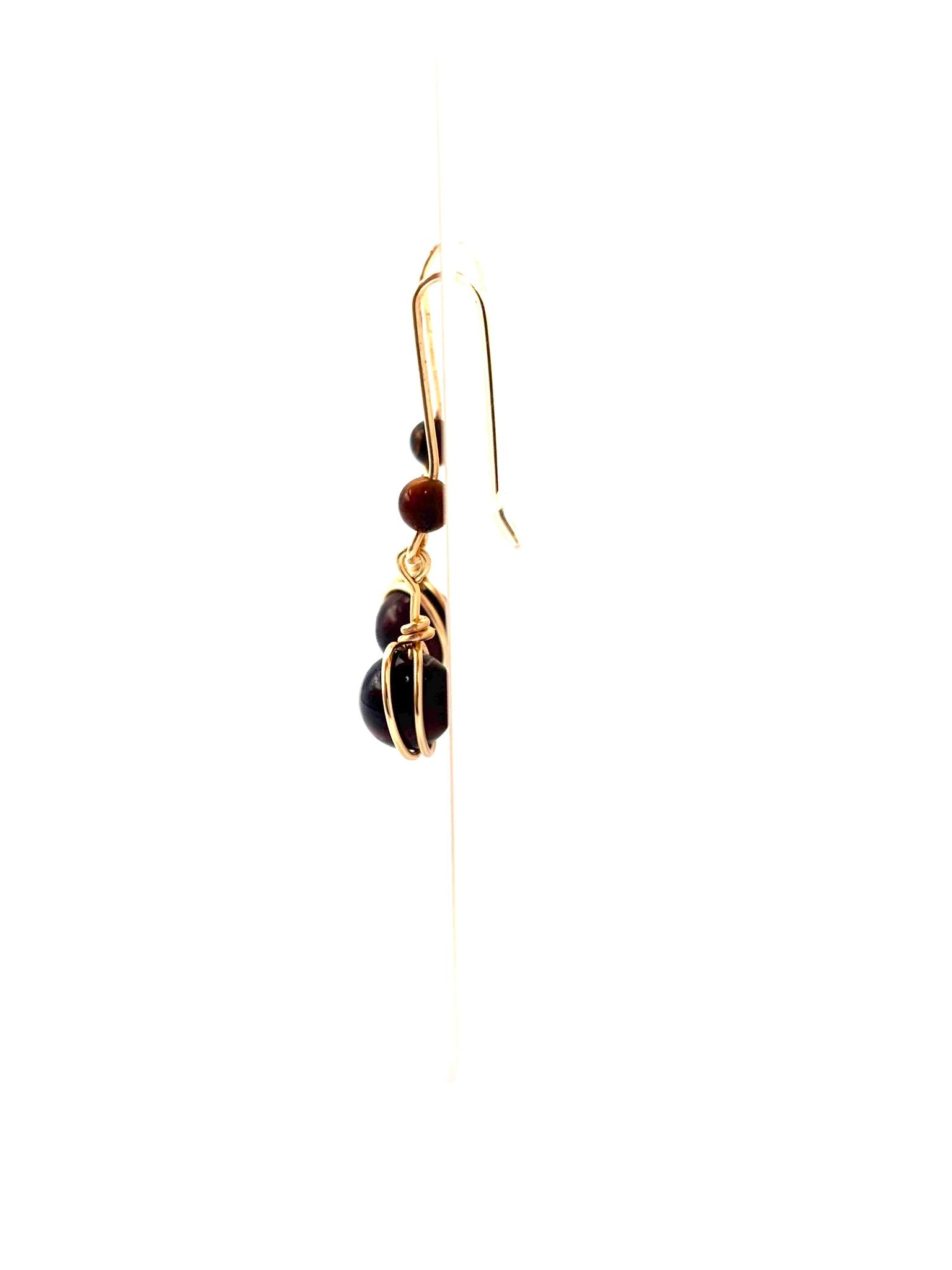 Pendientes Largos de Ojo de Buey – Elegancia Natural y Energía de Protección