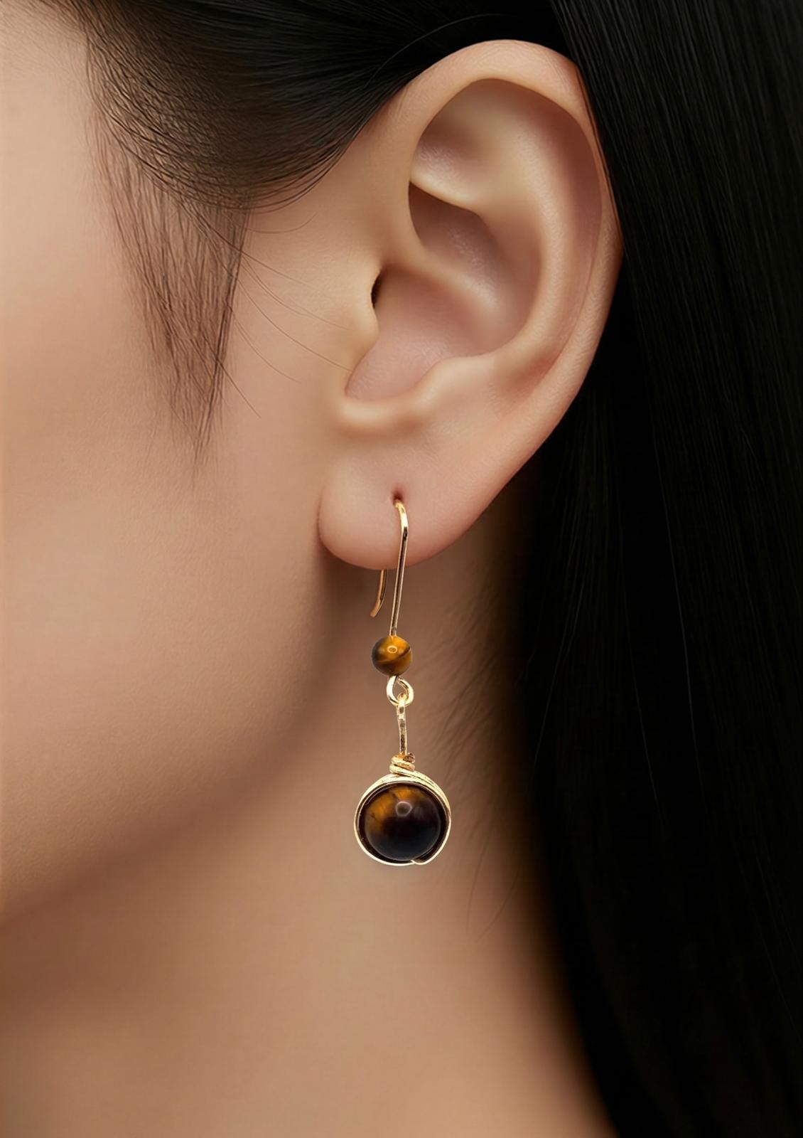 Pendientes Largos de Ojo de Tigre – Fuerza, Protección y Elegancia Natural