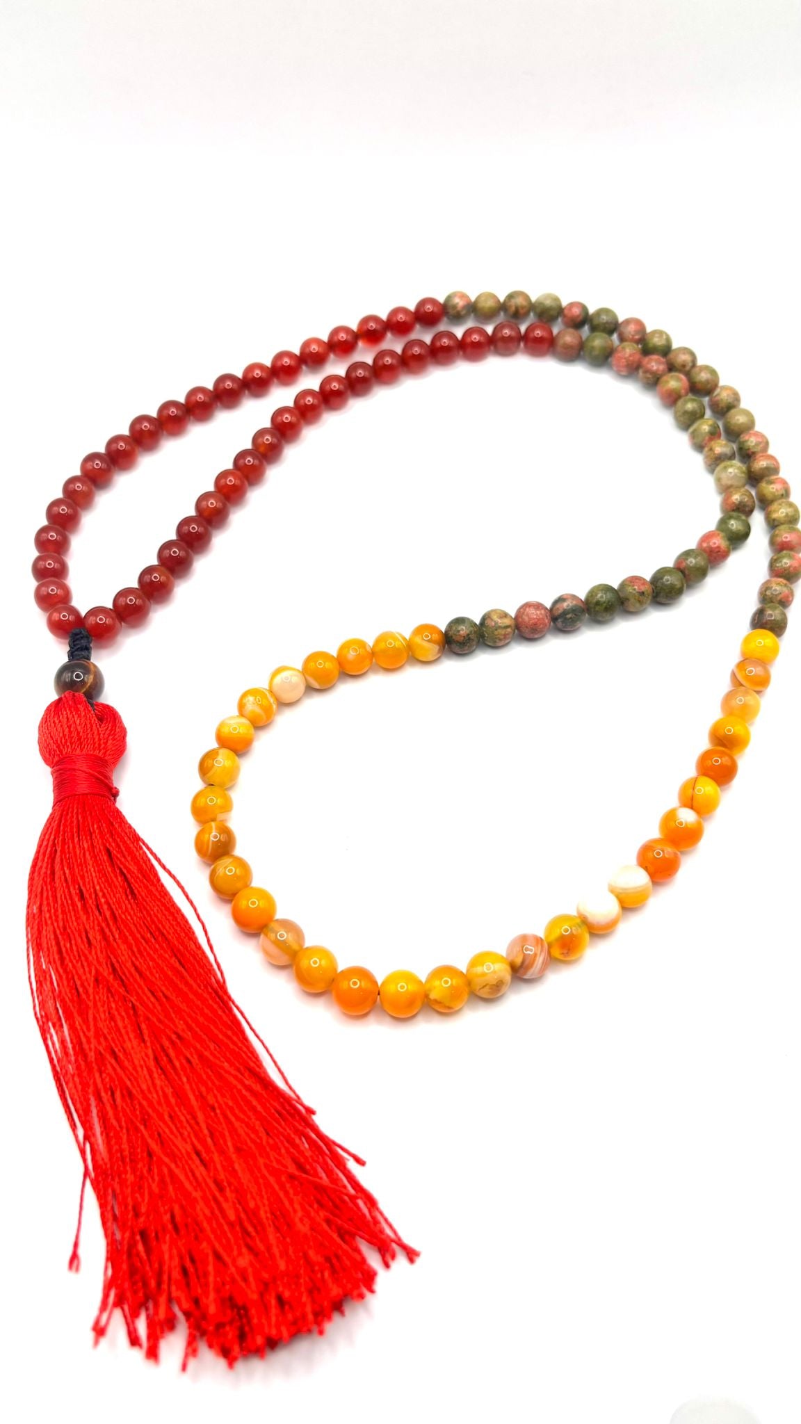 Japamala de Cornalina, Ágata Amarilla y Unakita con Piedra Guru de Ojo de Tigre y Borla Roja