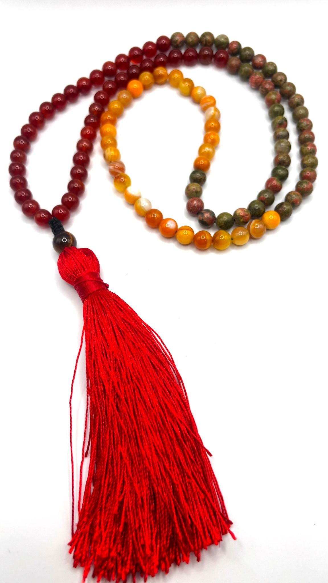 Japamala de Cornalina, Ágata Amarilla y Unakita con Piedra Guru de Ojo de Tigre y Borla Roja