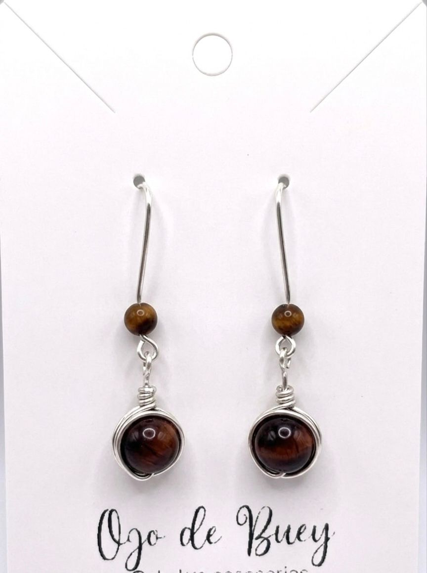 Pendientes Largos de Ojo de Buey – Elegancia Natural y Energía de Protección